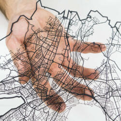 Lasercut street network of zurich in paper by Robin Hanhart