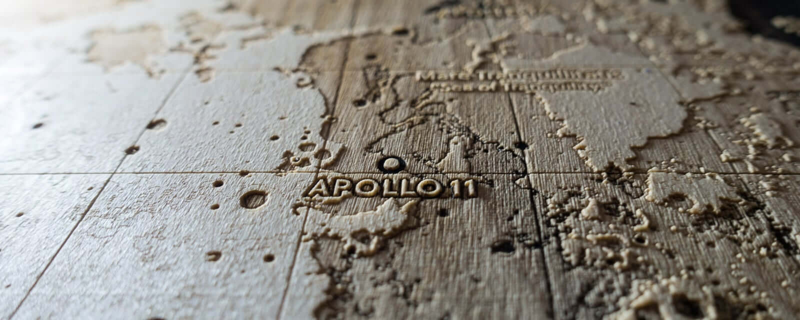 Topographic map of landing site of Apollo 11 on the Moon. Laser engraving in wood.